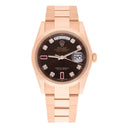 Rolex Day-Date 36 Ruby Baguette Diamond Dial 18k Rose Gold Watch 118205