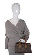 Louis Vuitton OnTheGo East-West Rev. Monogram