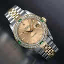 Rolex Datejust 31 Champagne Dial Two Tone Ladies Watch Diamond/Emerald Bezel 68273
