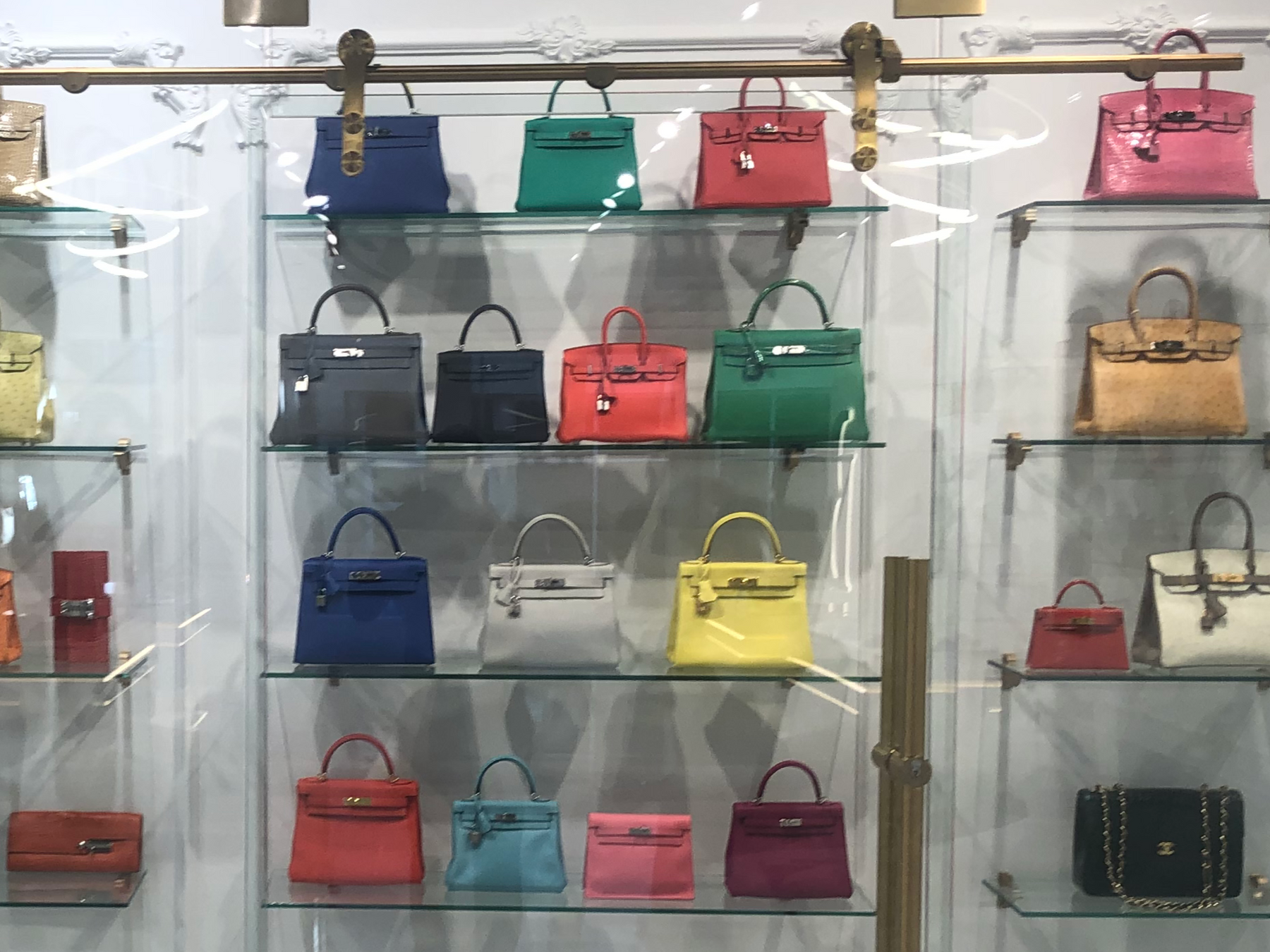 Display shelving of luxury handbags